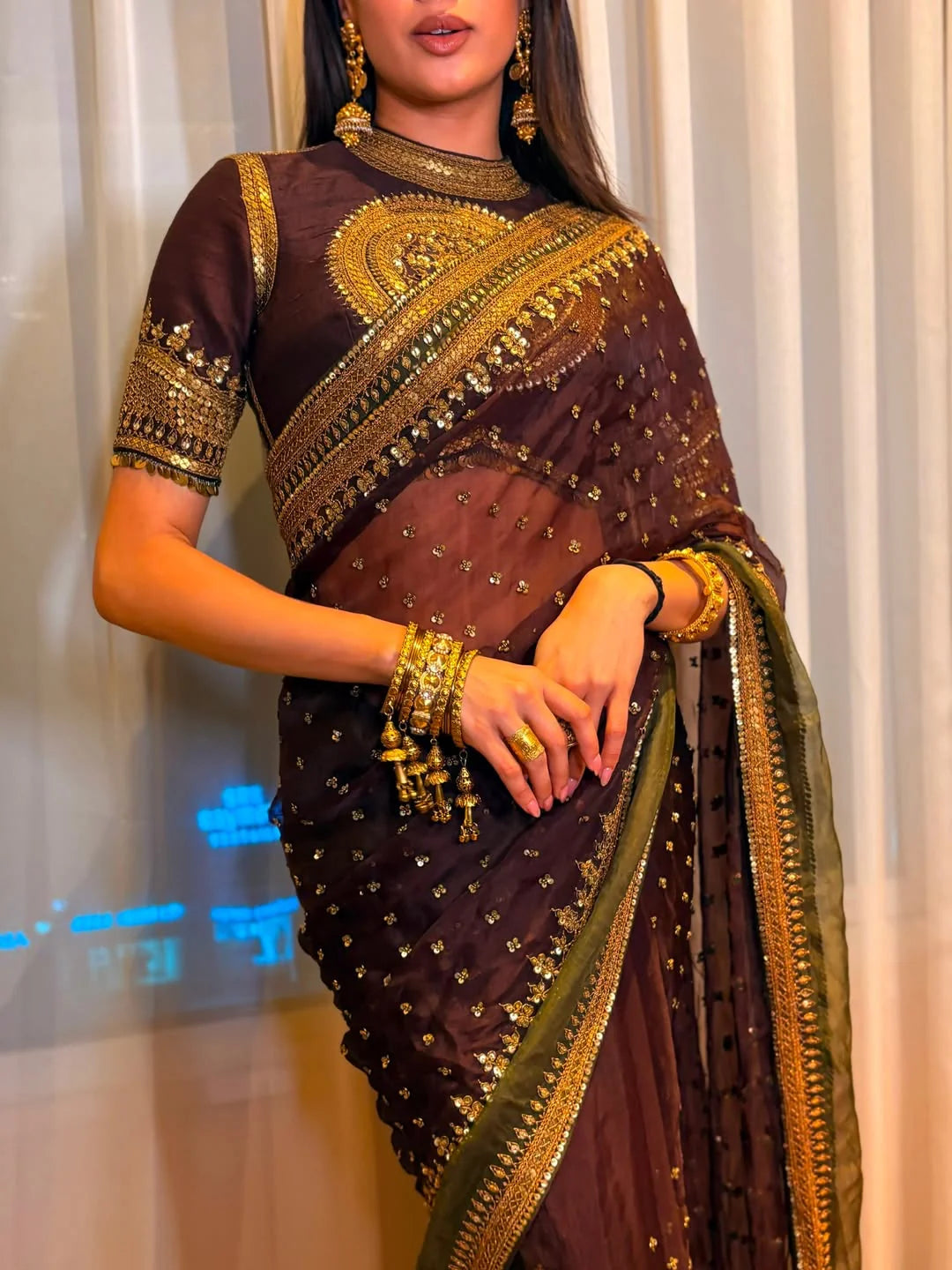 Bollywood Inspired Brown Twill Net Saree With Blouse