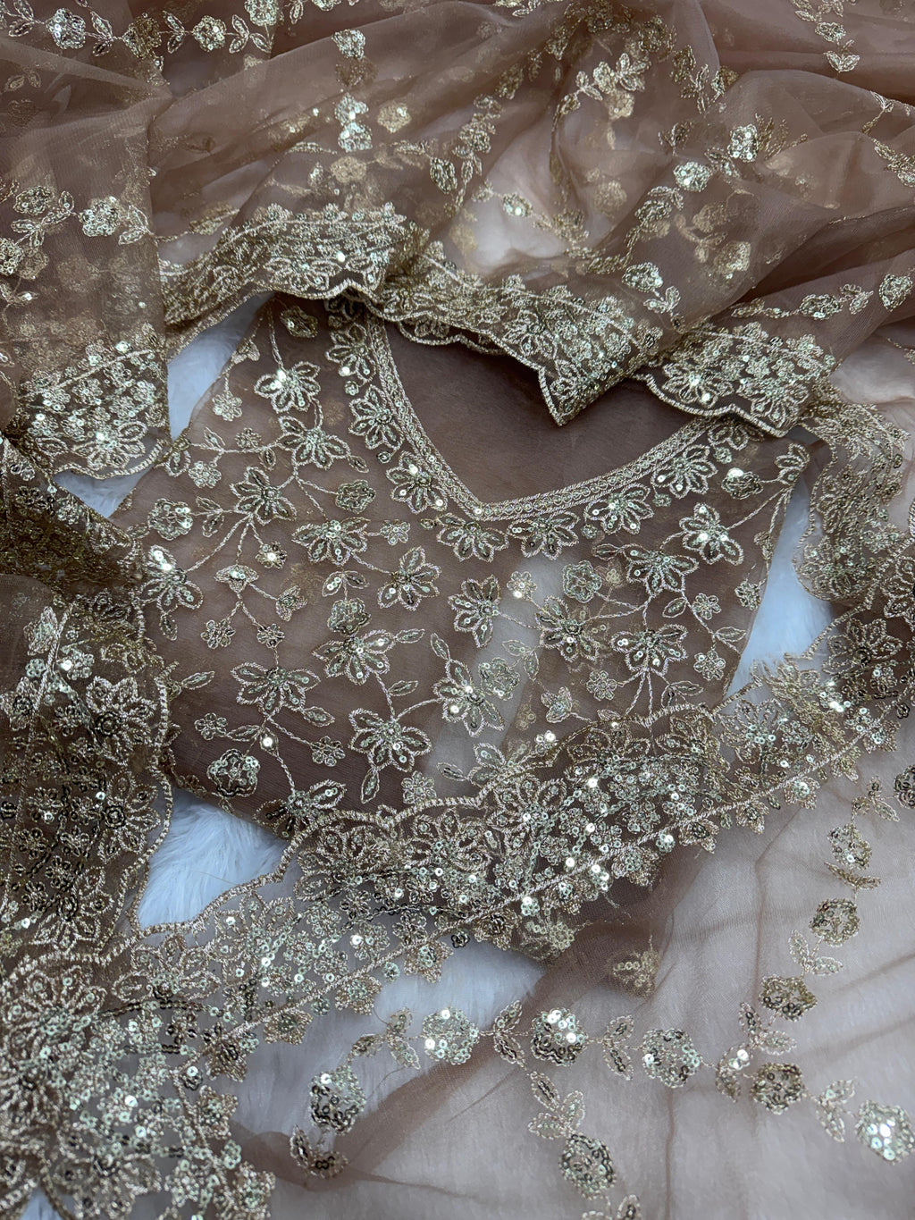 beautifully crafted with sequins and zari embroidery work